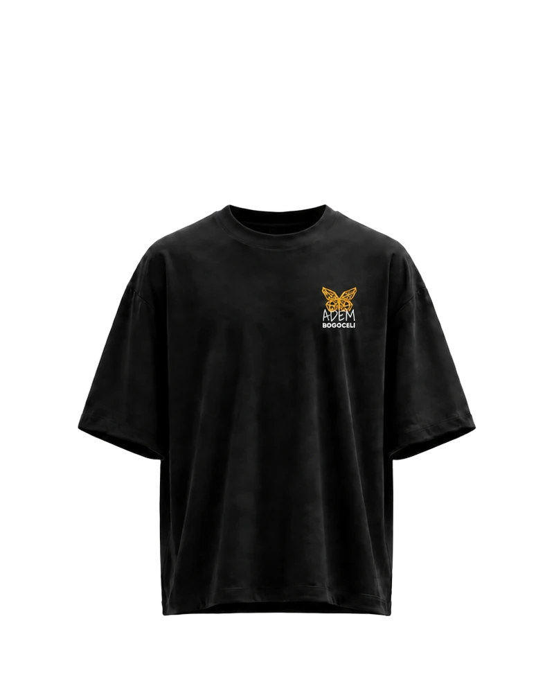 EMPOWERMENT Oversized Full Wing - schwarzes Oversized-Unisex-T-Shirt mit orangefarbenem Print, Vorderansicht